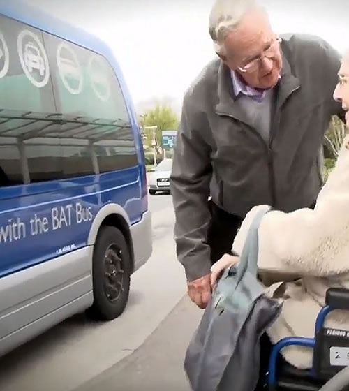 A passenger using the wheelchair-accessiblehospital hop