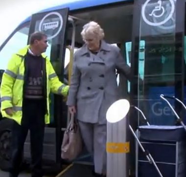 Our BAT Bus Our community bus picture of lady getting off the bus
