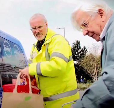 Volunteer Helping a member go shopping