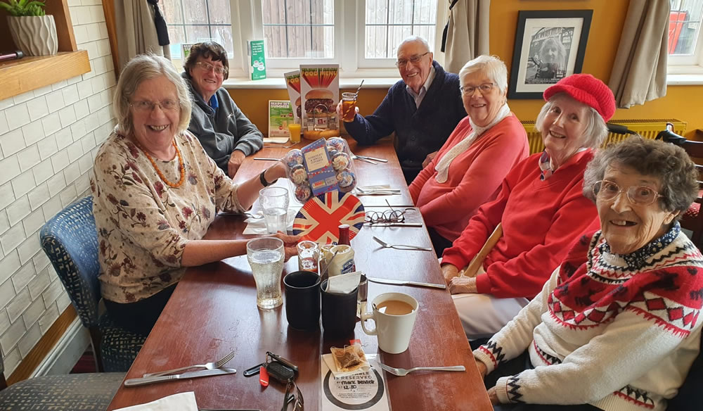 group of people enjoying a drink